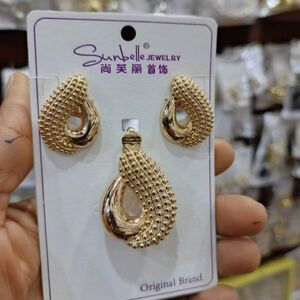 Gold Teardrop Earrings with Textured Design